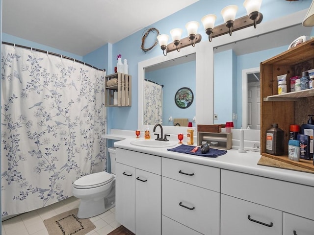 bathroom with a shower with shower curtain, tile patterned floors, toilet, and vanity