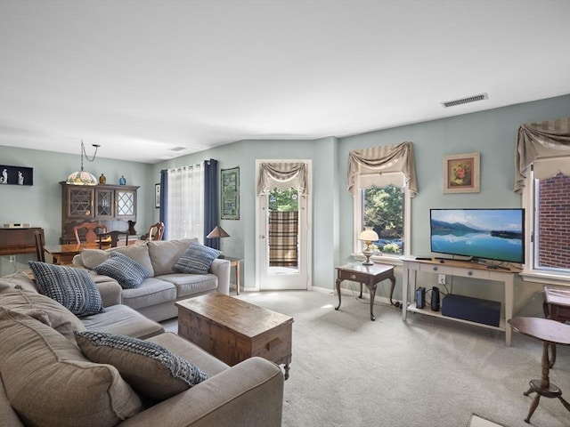 living room with light carpet