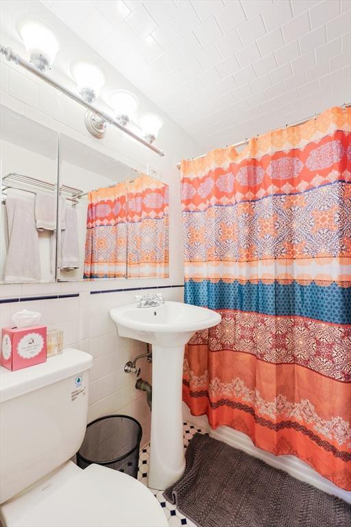 33 Saint Paul St Unit 3, Brookline, MA 02446 - bathroom featuring a shower with curtain