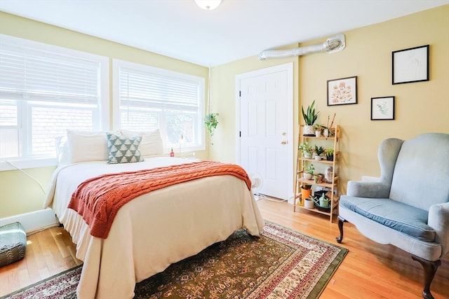 33 Saint Paul St Unit 3, Brookline, MA 02446 - bedroom with light wood-type flooring and multiple windows