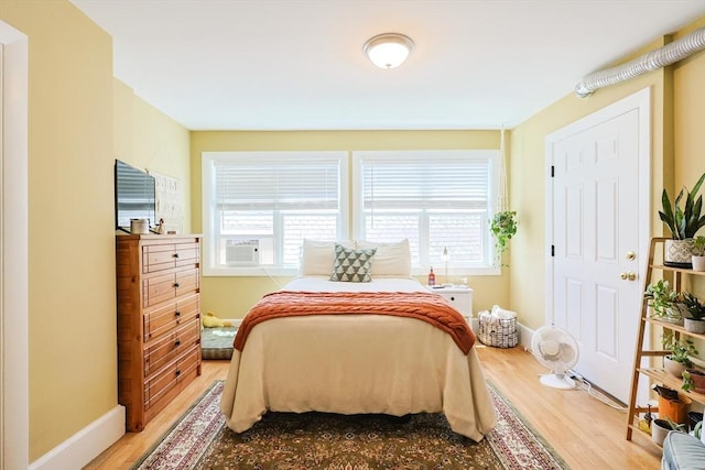 33 Saint Paul St Unit 3, Brookline, MA 02446 - bedroom with wood finished floors and multiple windows