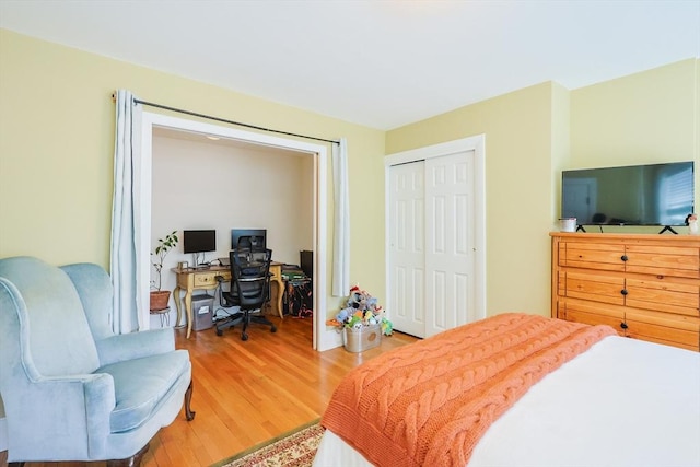 33 Saint Paul St Unit 3, Brookline, MA 02446 - bedroom featuring light wood-style flooring, a closet, and an office area