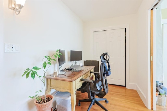 33 Saint Paul St Unit 3, Brookline, MA 02446 - office area featuring light wood-style flooring and baseboards