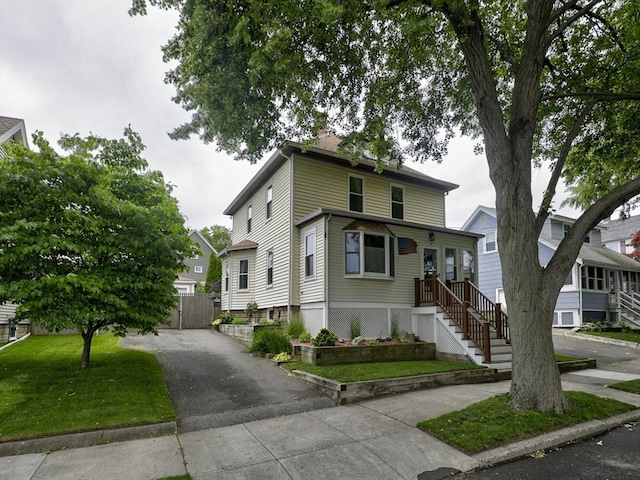 27 Newton Ave, Lynn, MA 01905 - american foursquare style home featuring driveway