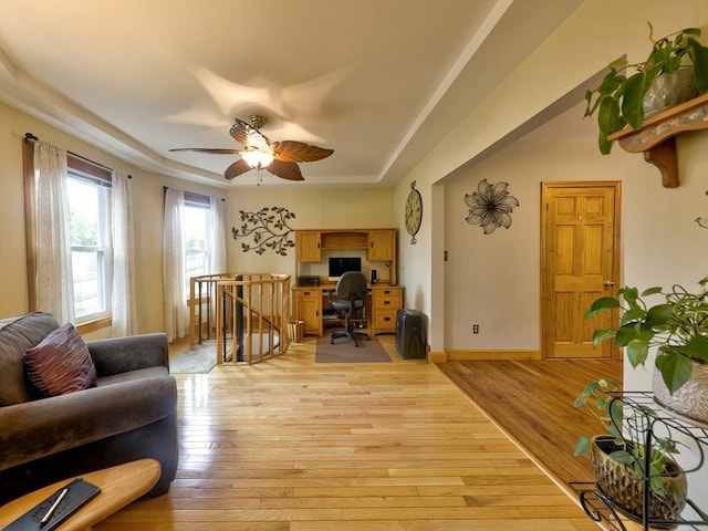 27 Newton Ave, Lynn, MA 01905 - living room featuring a raised ceiling, an office area, light wood-style floors, and ceiling fan