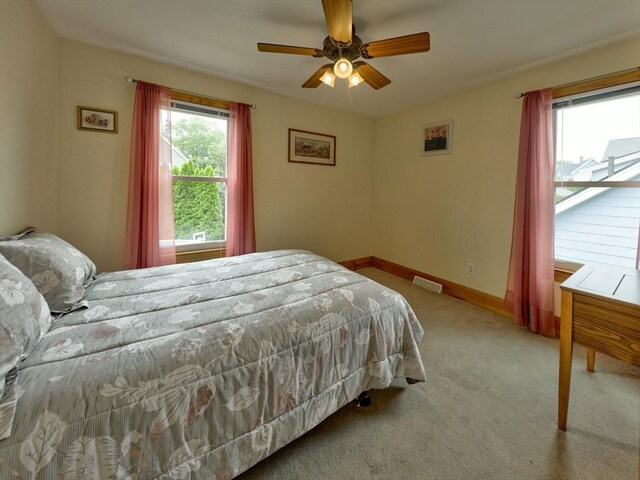 27 Newton Ave, Lynn, MA 01905 - bedroom with light colored carpet and ceiling fan