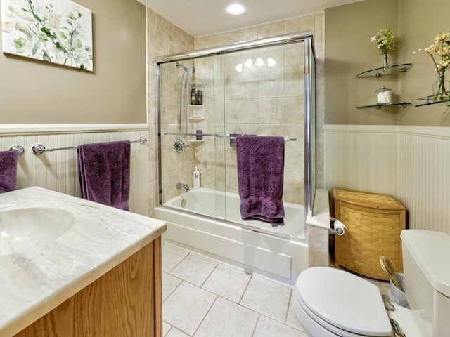 27 Newton Ave, Lynn, MA 01905 - bathroom featuring wainscoting, tile patterned floors, combined bath / shower with glass door, and vanity