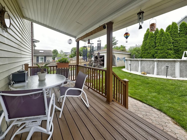 27 Newton Ave, Lynn, MA 01905 - wooden terrace with a lawn, outdoor dining area, and an outdoor structure