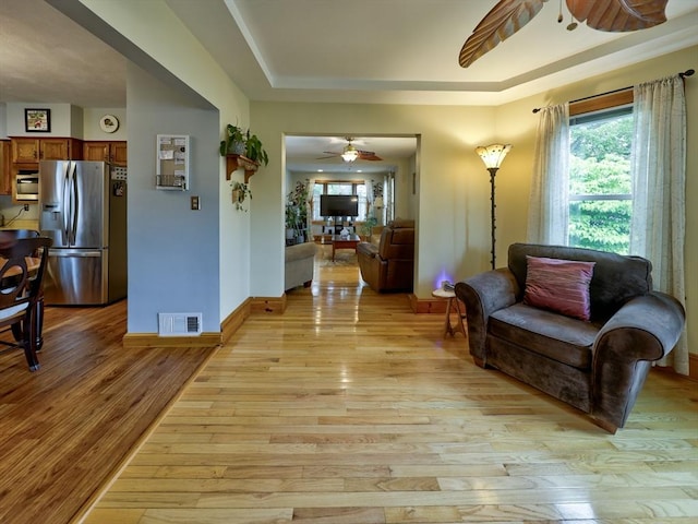 27 Newton Ave, Lynn, MA 01905 - living area with a ceiling fan, plenty of natural light, and light wood finished floors