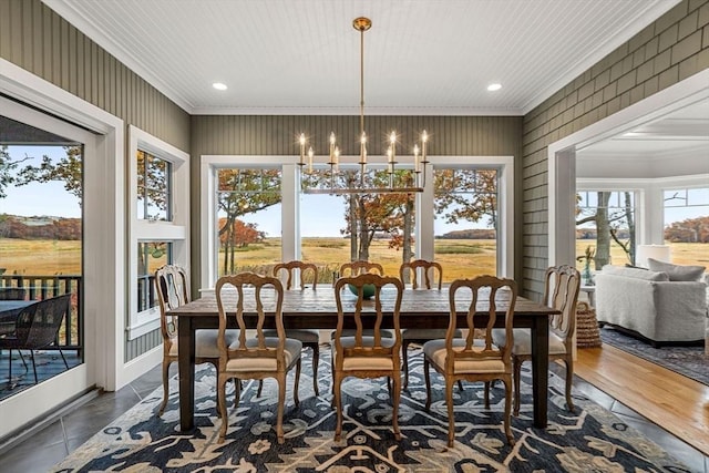 dining room featuring recessed lighting, a notable chandelier, and ornamental molding