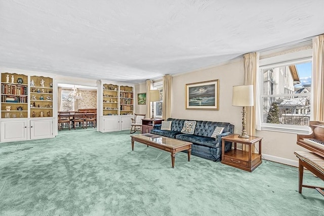 living room featuring ornamental molding, plenty of natural light, and carpet flooring