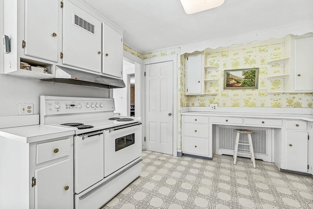 kitchen featuring white cabinetry and double oven range