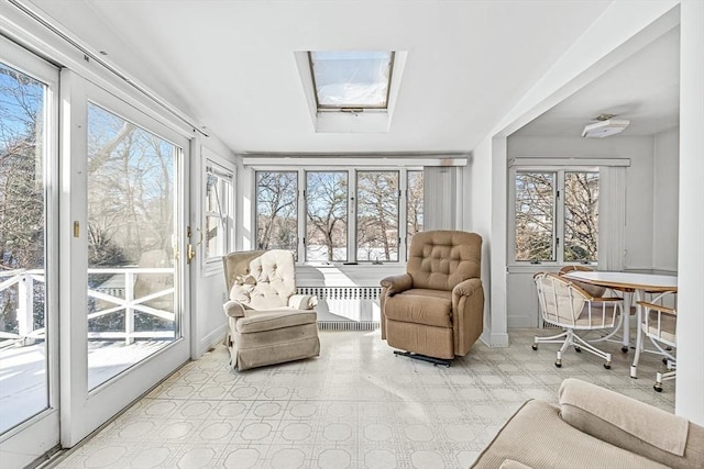 sunroom featuring a skylight