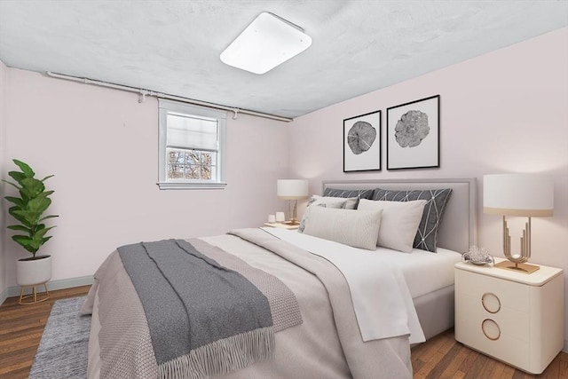 bedroom featuring dark wood-type flooring