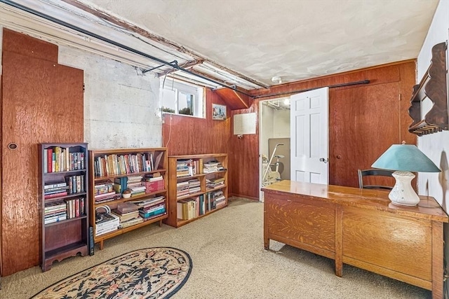 home office featuring wooden walls