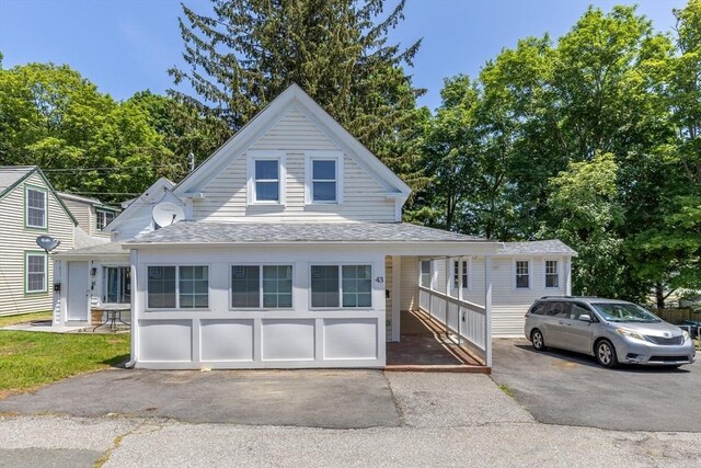 43 Hobart Ter, Braintree, MA 02184 - view of front of home with driveway and a shingled roof