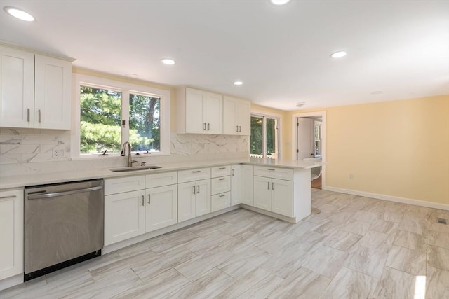43 Hobart Ter, Braintree, MA 02184 - kitchen with dishwasher, a peninsula, light countertops, backsplash, and white cabinetry