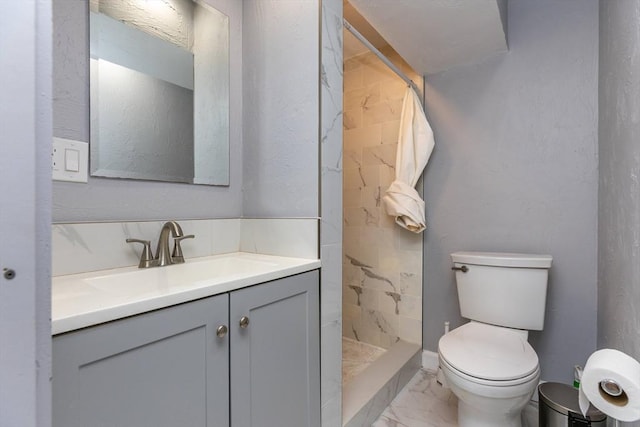 43 Hobart Ter, Braintree, MA 02184 - bathroom featuring marble look tile flooring, vanity, and a shower stall