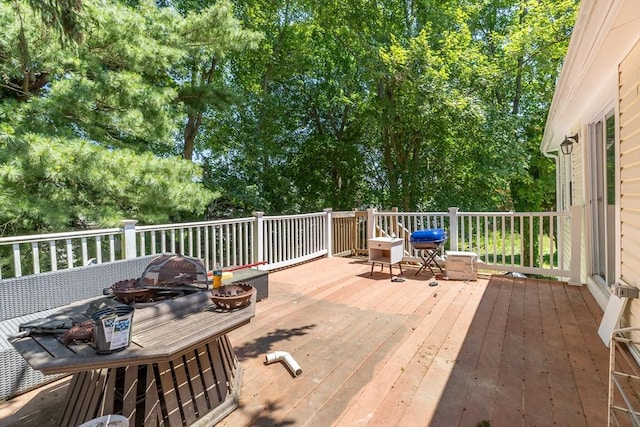43 Hobart Ter, Braintree, MA 02184 - wooden deck featuring an outdoor fire pit and view of wooded area