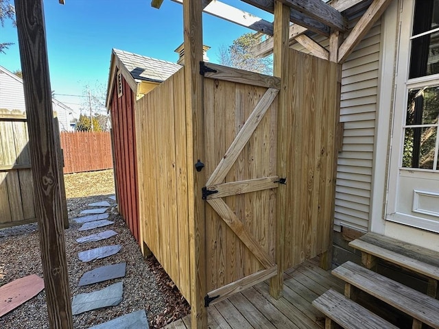 view of outdoor structure with fence