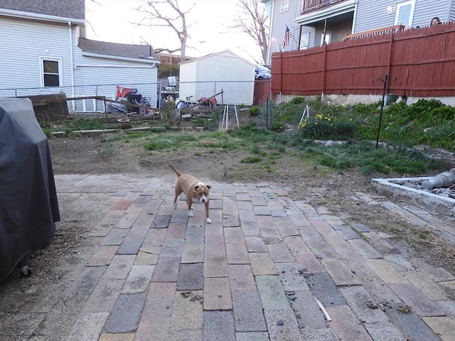 view of patio with fence and grilling area
