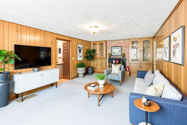 37 Colonial Way, Rehoboth, MA 02769 - living room with wood walls and carpet