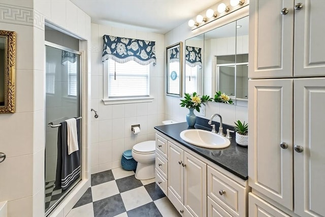 37 Colonial Way, Rehoboth, MA 02769 - full bath with vanity, a shower stall, and tile walls