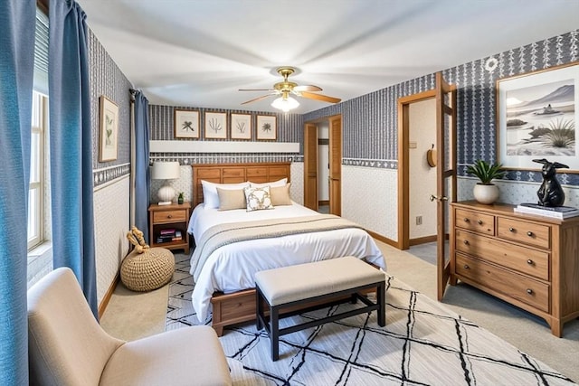 37 Colonial Way, Rehoboth, MA 02769 - bedroom with wallpapered walls, light carpet, and ceiling fan
