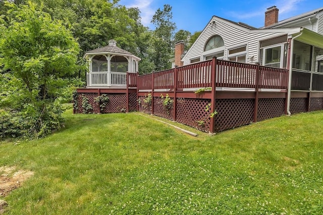 37 Colonial Way, Rehoboth, MA 02769 - view of grassy yard featuring a gazebo, a sunroom, and a deck