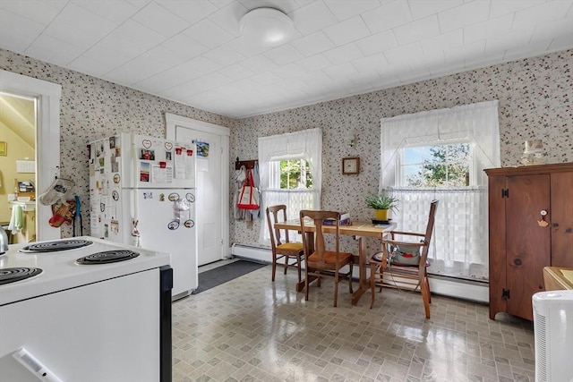 dining area featuring baseboard heating