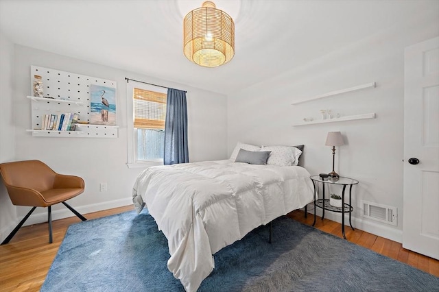 10 Stoughton Rd, Dedham, MA 02026 - bedroom with wood finished floors and baseboards