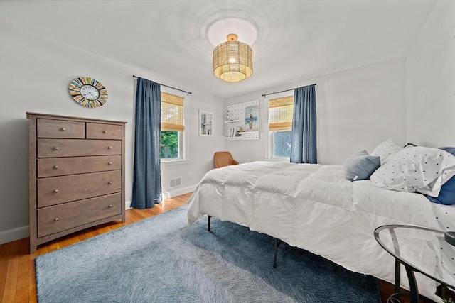 10 Stoughton Rd, Dedham, MA 02026 - bedroom featuring baseboards and wood finished floors
