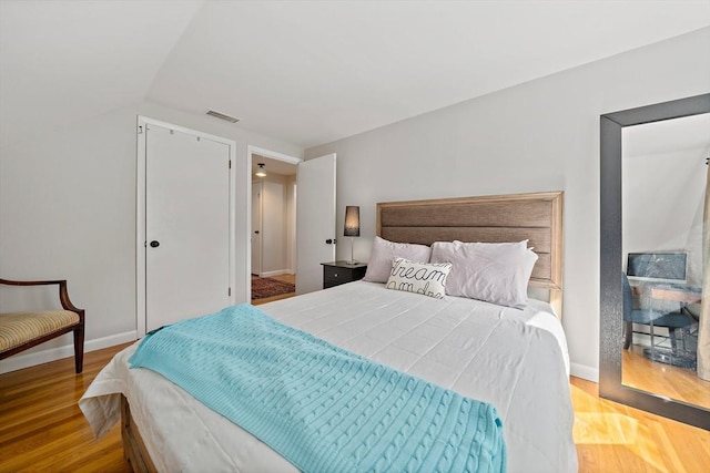 10 Stoughton Rd, Dedham, MA 02026 - bedroom featuring wood finished floors and baseboards