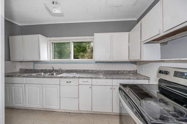 34 May St, Lowell, MA 01850 - kitchen featuring stainless steel electric stove, ornamental molding, and white cabinetry