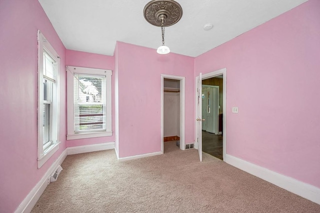 34 May St, Lowell, MA 01850 - unfurnished bedroom with carpet flooring and baseboards