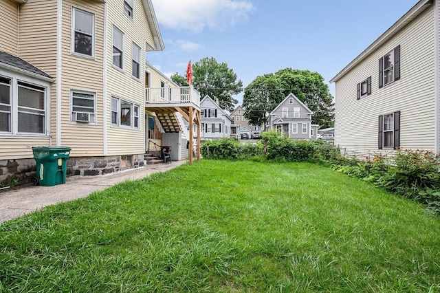34 May St, Lowell, MA 01850 - view of green lawn with a residential view and entry steps