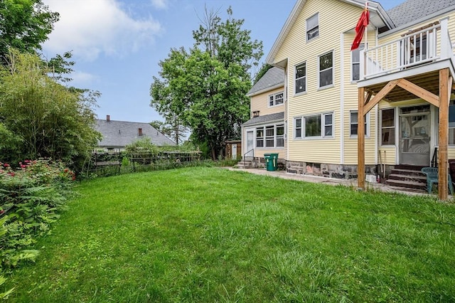 34 May St, Lowell, MA 01850 - back of house with entry steps and a balcony