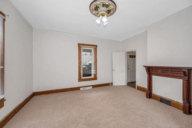 34 May St, Lowell, MA 01850 - unfurnished living room with carpet flooring