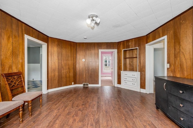 34 May St, Lowell, MA 01850 - unfurnished room featuring wooden walls and dark wood-style floors