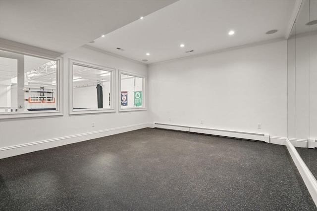 empty room with crown molding, visible vents, recessed lighting, baseboards, and a baseboard heating unit