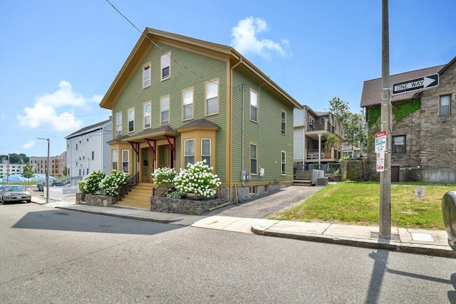 49 Norfolk St, Boston, MA 02119 - view of front of home with a front lawn