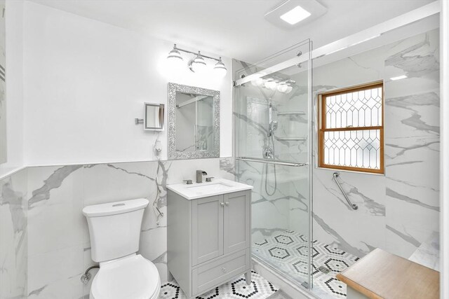 49 Norfolk St, Boston, MA 02119 - bathroom featuring vanity, a marble finish shower, toilet, and tile walls