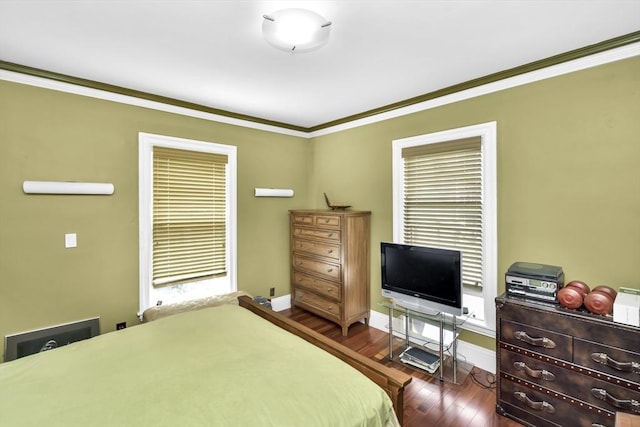 49 Norfolk St, Boston, MA 02119 - bedroom featuring baseboards, ornamental molding, and dark wood-type flooring