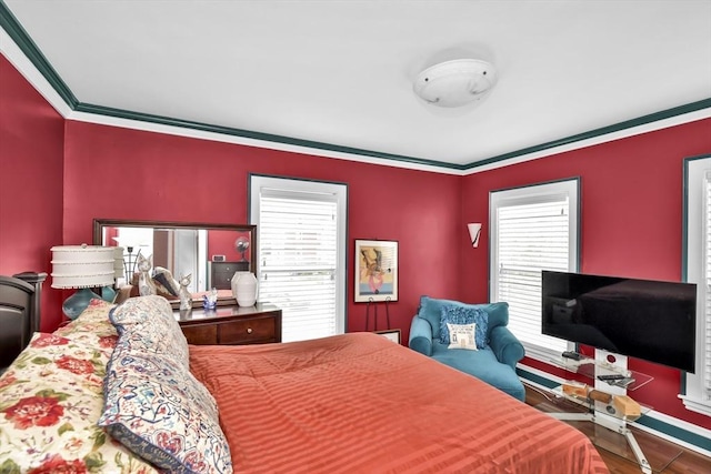 49 Norfolk St, Boston, MA 02119 - bedroom with baseboards, ornamental molding, wood finished floors, and multiple windows