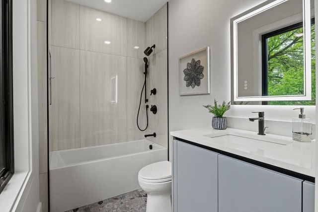 bathroom featuring bathtub / shower combination, toilet, vanity, and recessed lighting
