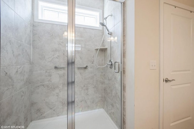 full bathroom with a shower stall