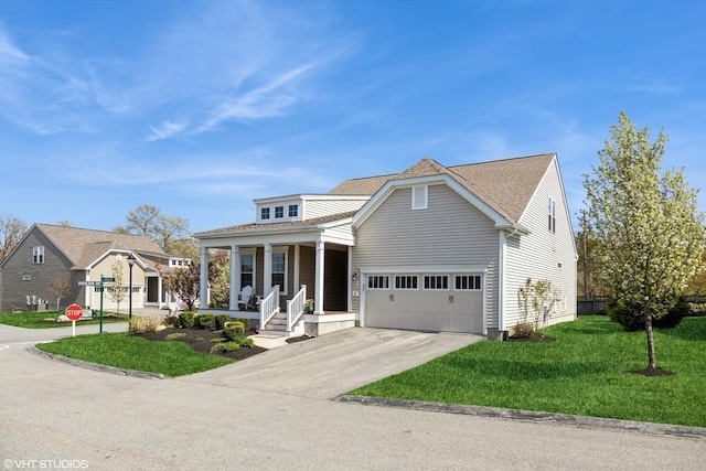 view of front of property with a garage, covered porch, concrete driveway, and a front lawn
