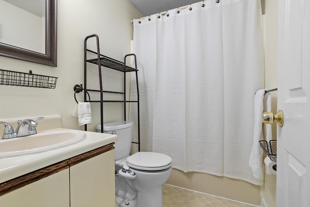 full bathroom featuring shower / tub combo with curtain, vanity, a textured ceiling, and toilet