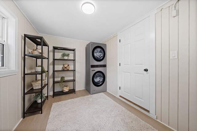 9 Josephine, Canton, MA 02021 - laundry area featuring estacked washer and dryer, wood finished floors, and ornamental molding