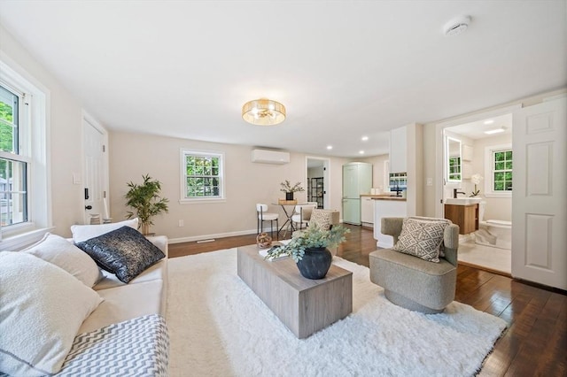 9 Josephine, Canton, MA 02021 - living room featuring a wall unit AC, dark wood-style flooring, plenty of natural light, baseboards, and recessed lighting